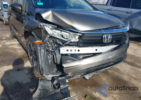 2021 Honda Odyssey Elite z USA, uszkodzony, nr VIN 5FNRL6H98MB010450
